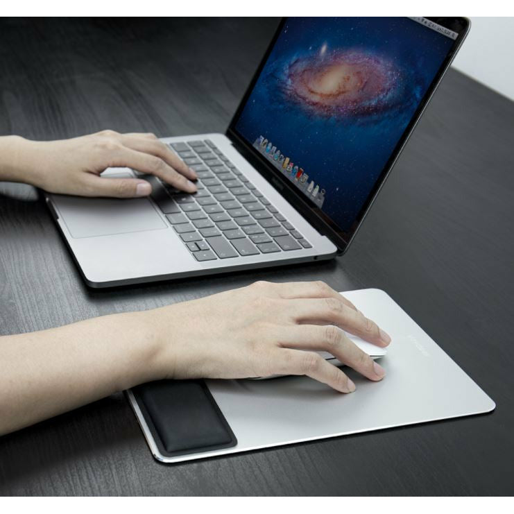 laptop with metal mouse pad with wrist support